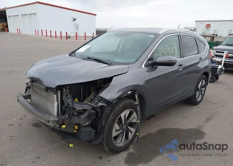 2015 Honda Cr-V Touring z USA, uszkodzony, nr VIN 5J6RM4H97FL132857